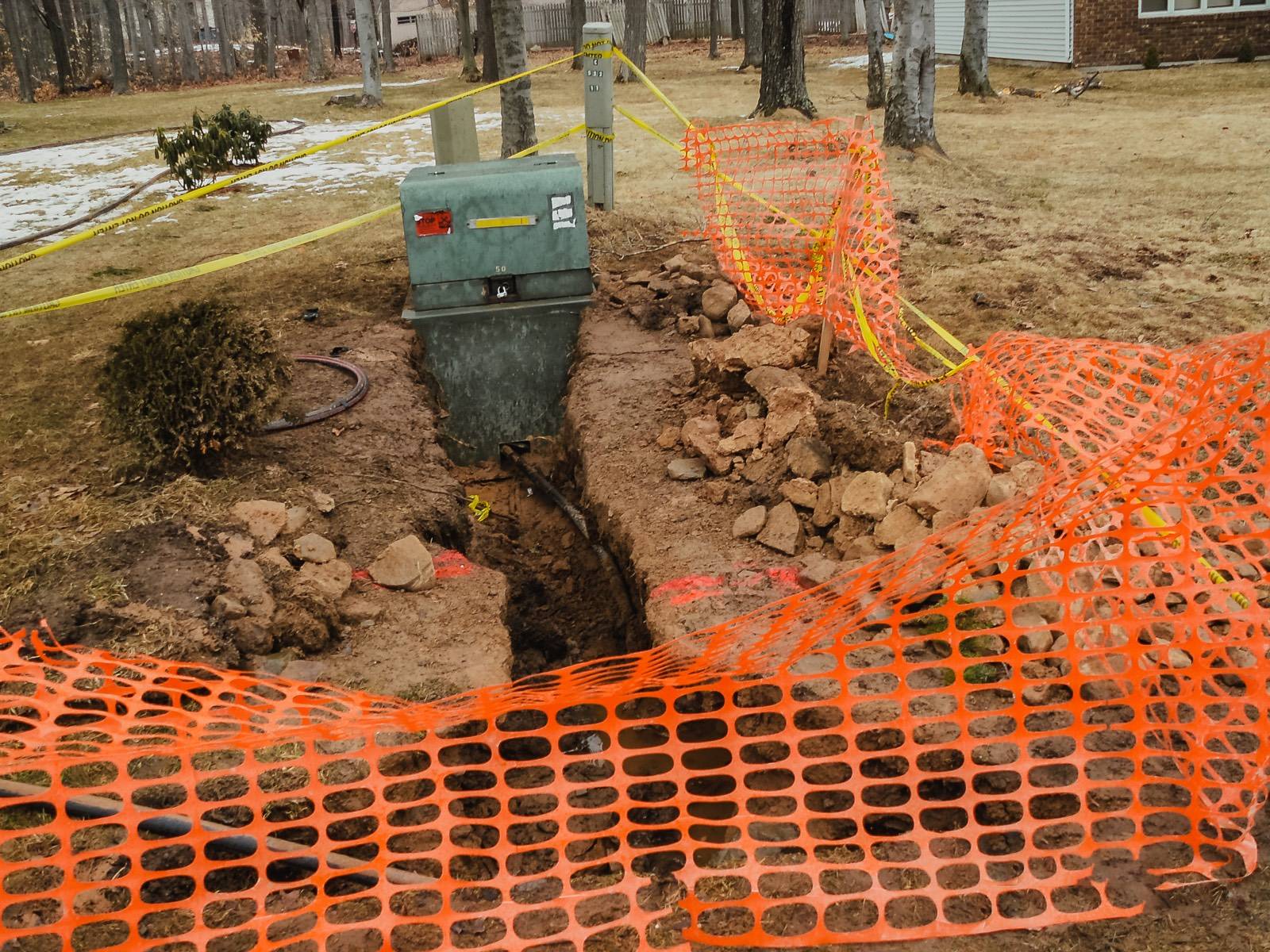Excavation at a padmount, fenced and taped